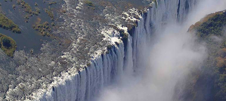 Time to fulfill those resolutions, take out the camera and become a domestic tourist. Victoria Falls, Zimbabwe.